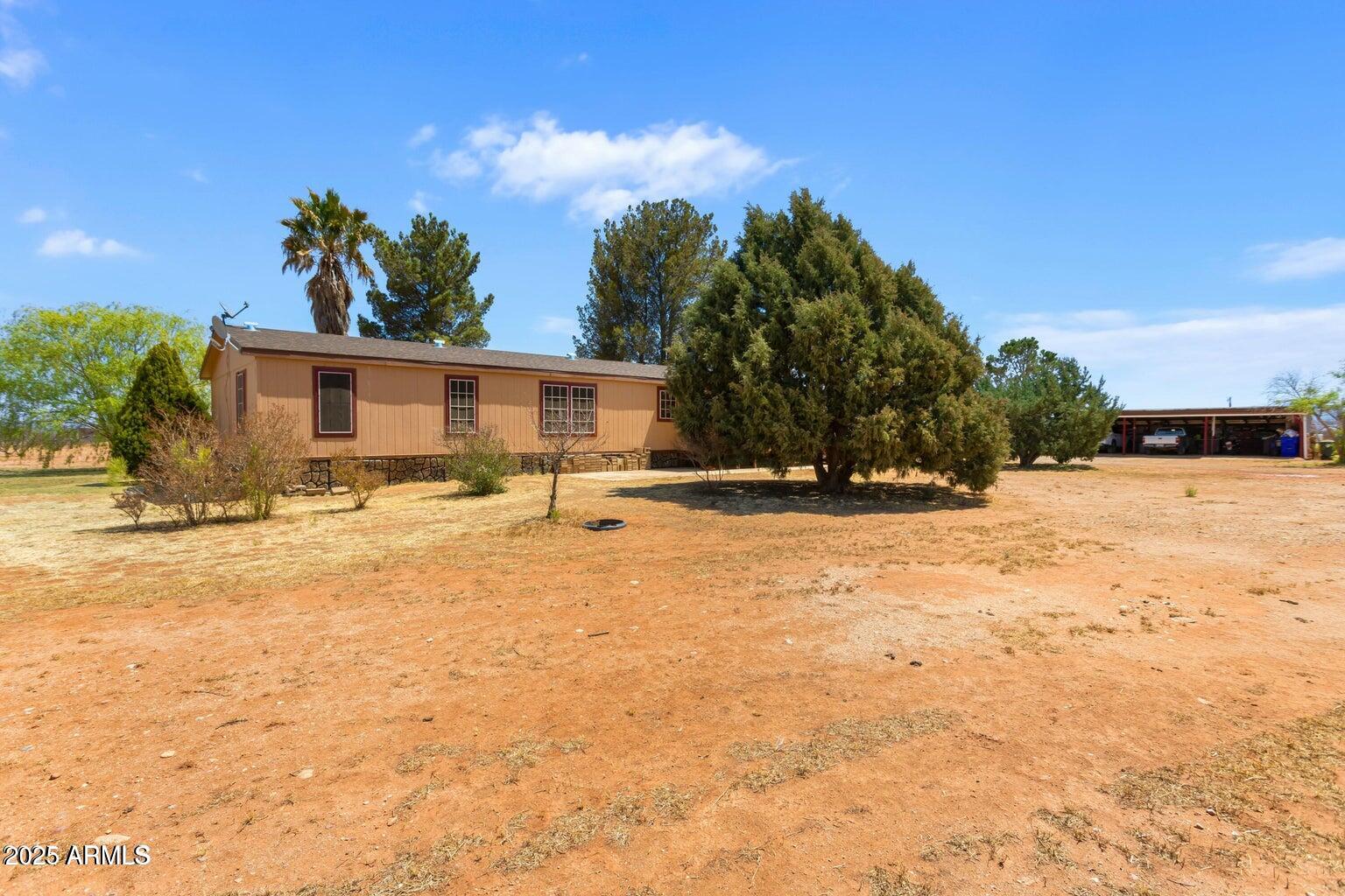 5780 South Mescalero Road Hereford, AZ 85615 - Photo 31 of 45 a view of swimming pool with outdoor seating