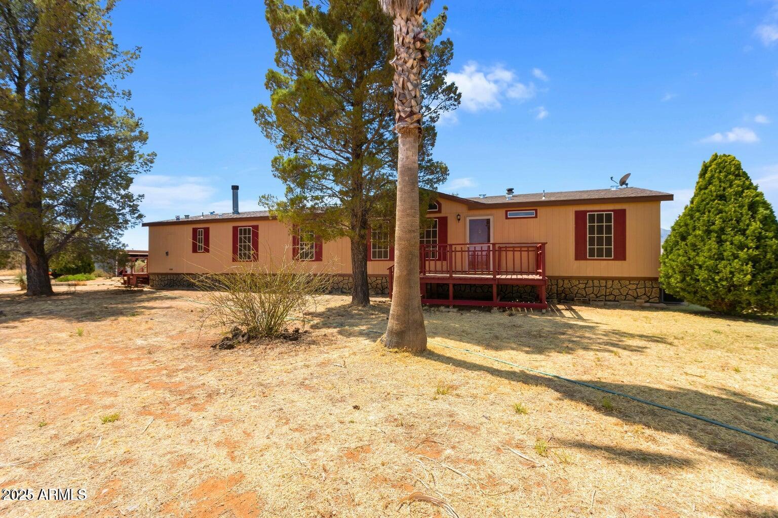 5780 South Mescalero Road Hereford, AZ 85615 - Photo 34 of 45 a view of a house with snow in the yard