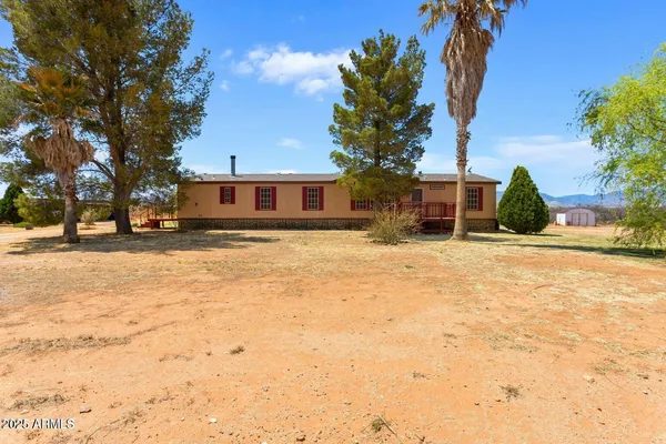 a view of large building with a yard