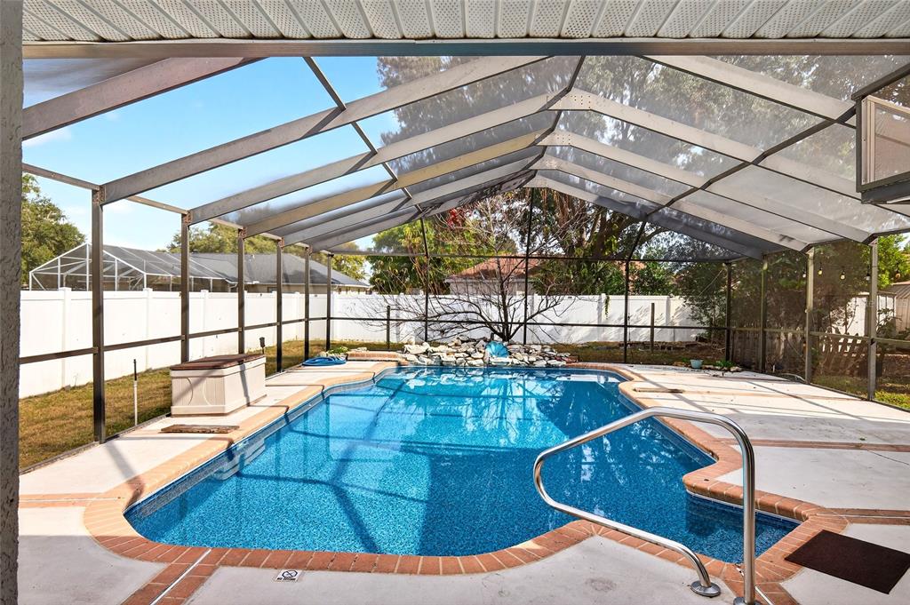 7839 Southwest 63rd Ave Road Ocala, FL 34476 - Photo 16 of 41 a view of a swimming pool with a patio