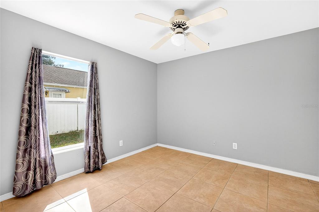 7839 Southwest 63rd Ave Road Ocala, FL 34476 - Photo 26 of 41 a view of an empty room with a window
