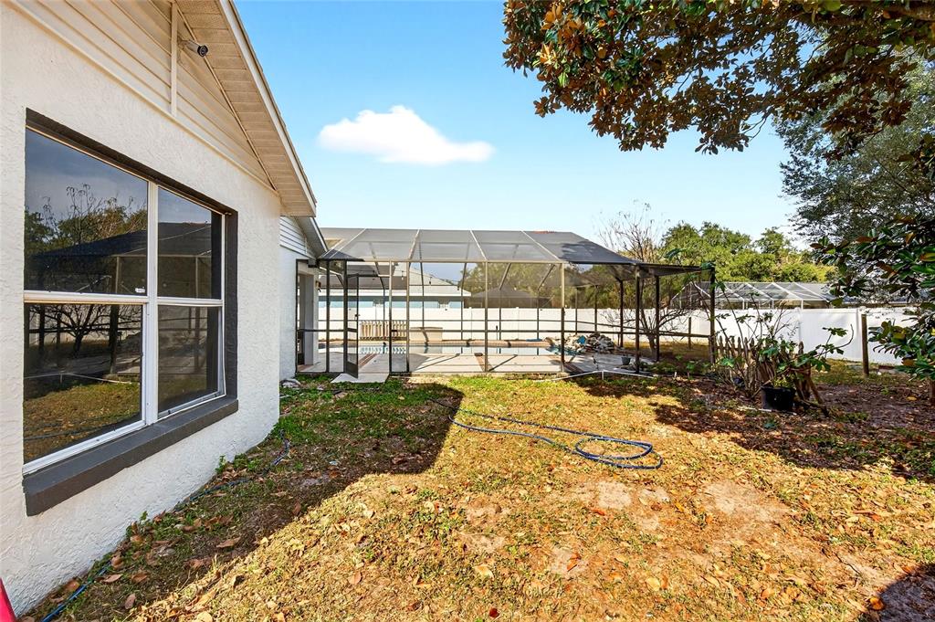 7839 Southwest 63rd Ave Road Ocala, FL 34476 - Photo 37 of 41 a view of a house with a yard