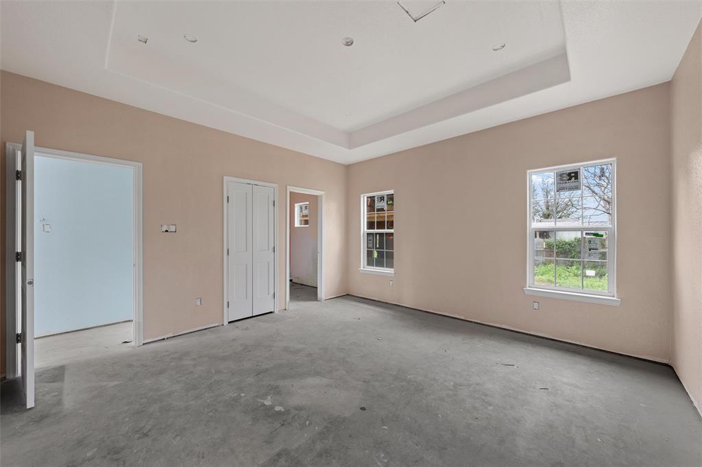 211 Lopez Street Bellmead, TX 76705 - Photo 7 of 15 an empty room with windows
