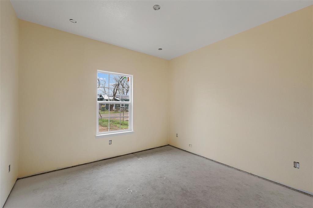 211 Lopez Street Bellmead, TX 76705 - Photo 10 of 15 a view of an empty room with a window