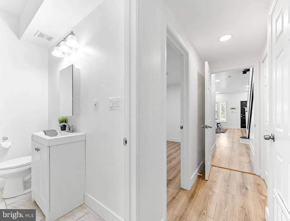 2542 Harford Road, Unit A Baltimore, MD 21218 - Photo 3 of 11 Bright and airy hallway with modern finishes.