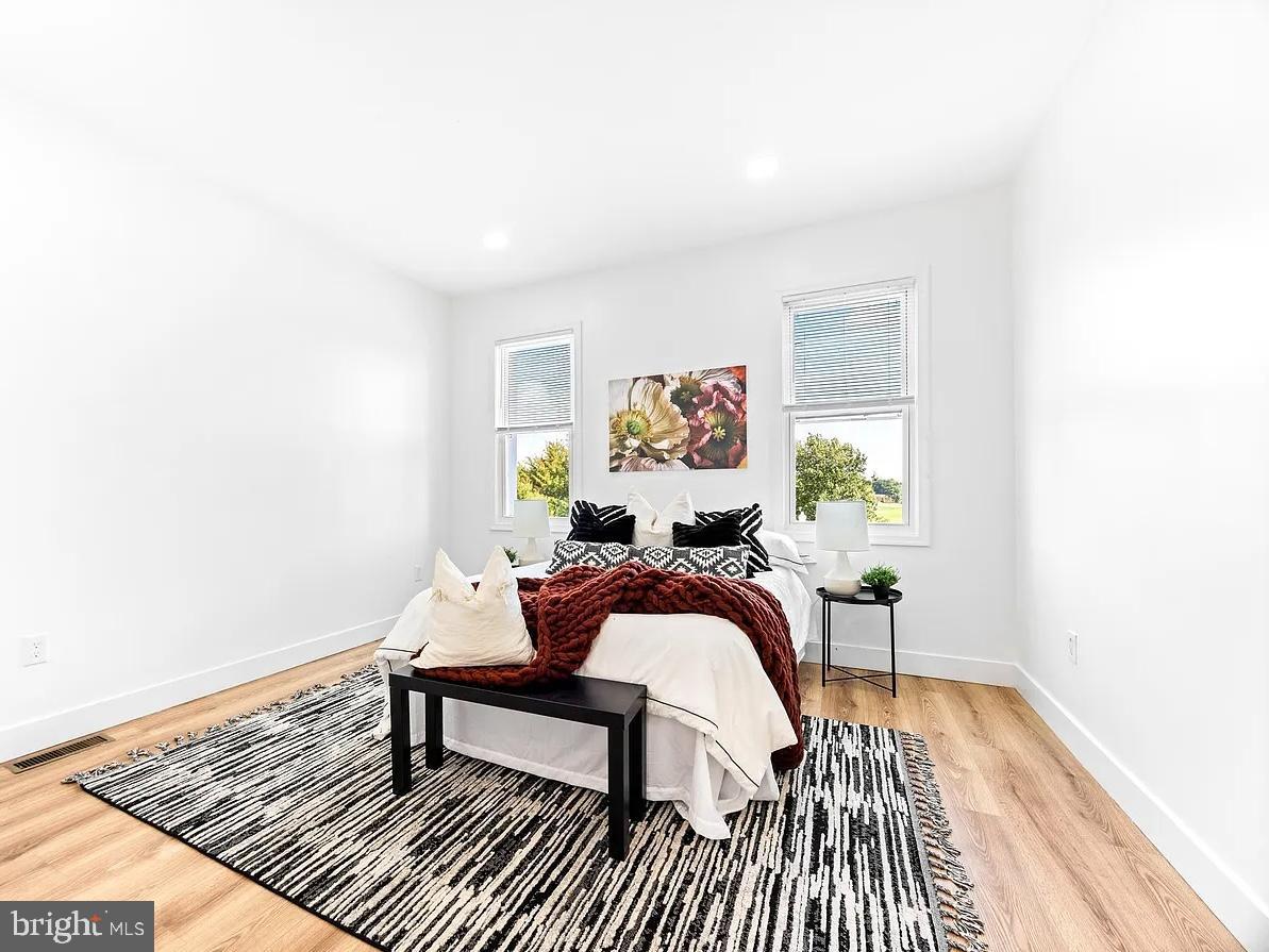 2542 Harford Road, Unit A Baltimore, MD 21218 - Photo 4 of 11 Bright and airy bedroom with modern charm.