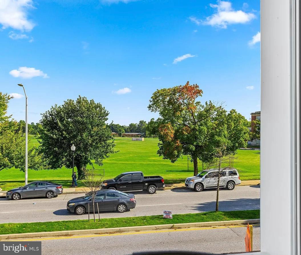 2542 Harford Road, Unit A Baltimore, MD 21218 - Photo 5 of 11 Scenic view of green park and blue skies.