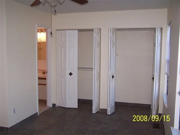 a view of a hallway with closet area