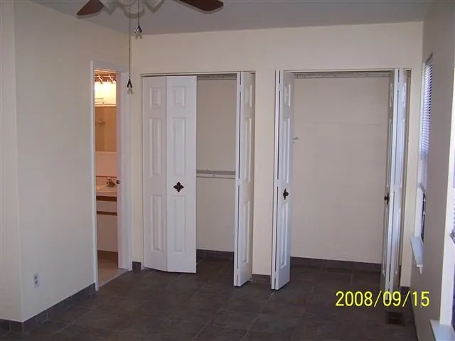 a view of a hallway with closet area