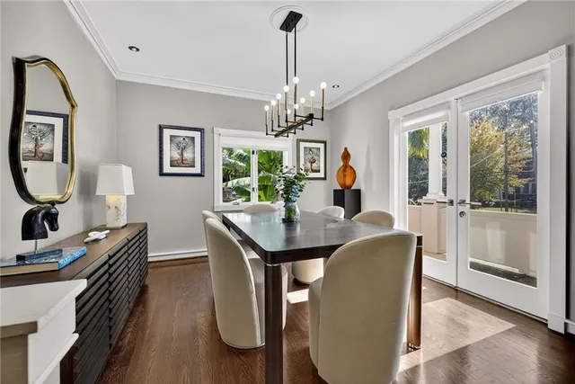 a kitchen with stainless steel appliances granite countertop a stove and a large refrigerator