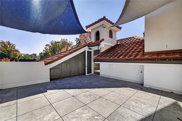 a front view of a house with a porch