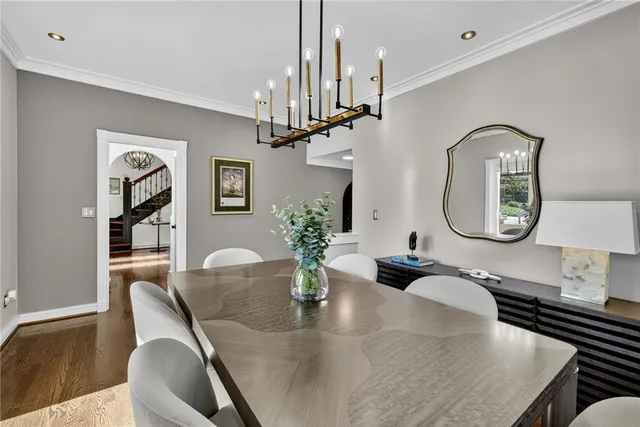 a view of a patio with table and chairs with wooden floor