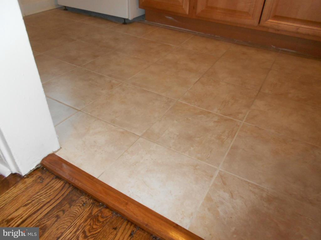 2811 16th Road South, Unit 2811A Arlington, VA 22204 - Photo 13 of 30 New tile floors in kitchen.
