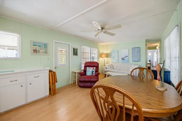 a bedroom with furniture and wooden floor