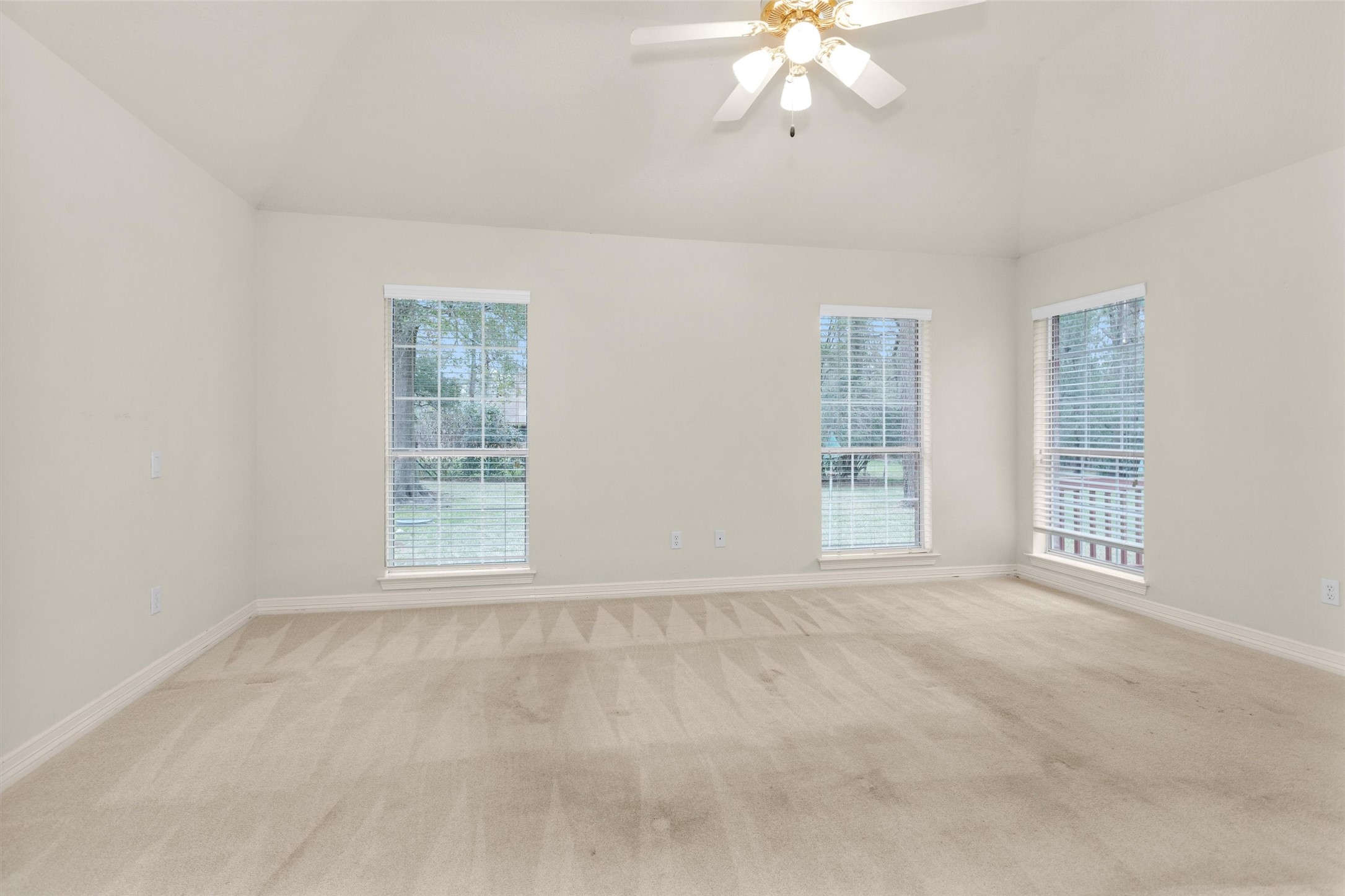 2419 Carriage Ridge Lane Conroe, TX 77384 - Photo 25 of 39 a view of an empty room with a window