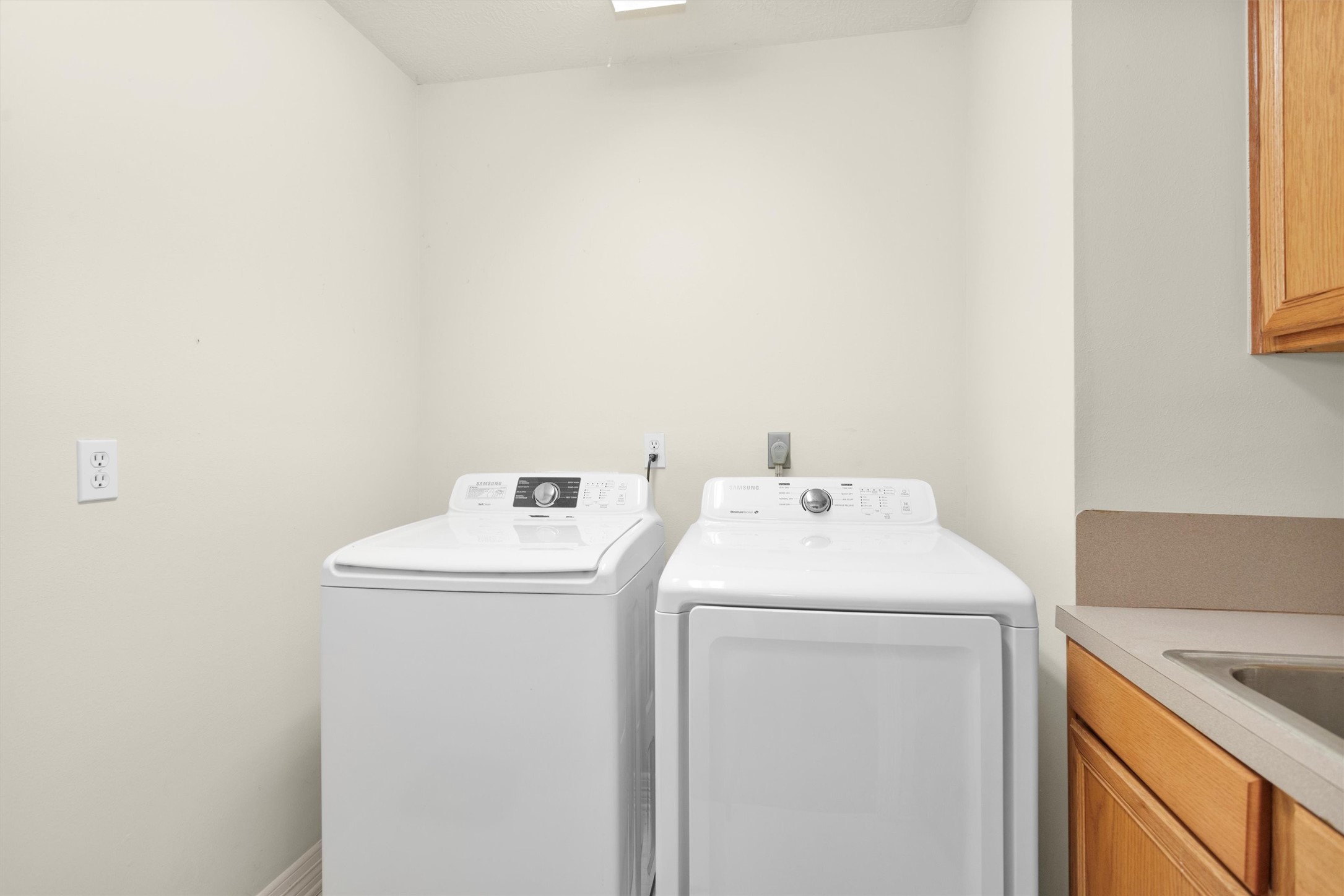 2419 Carriage Ridge Lane Conroe, TX 77384 - Photo 27 of 39 a utility room with dryer and washer