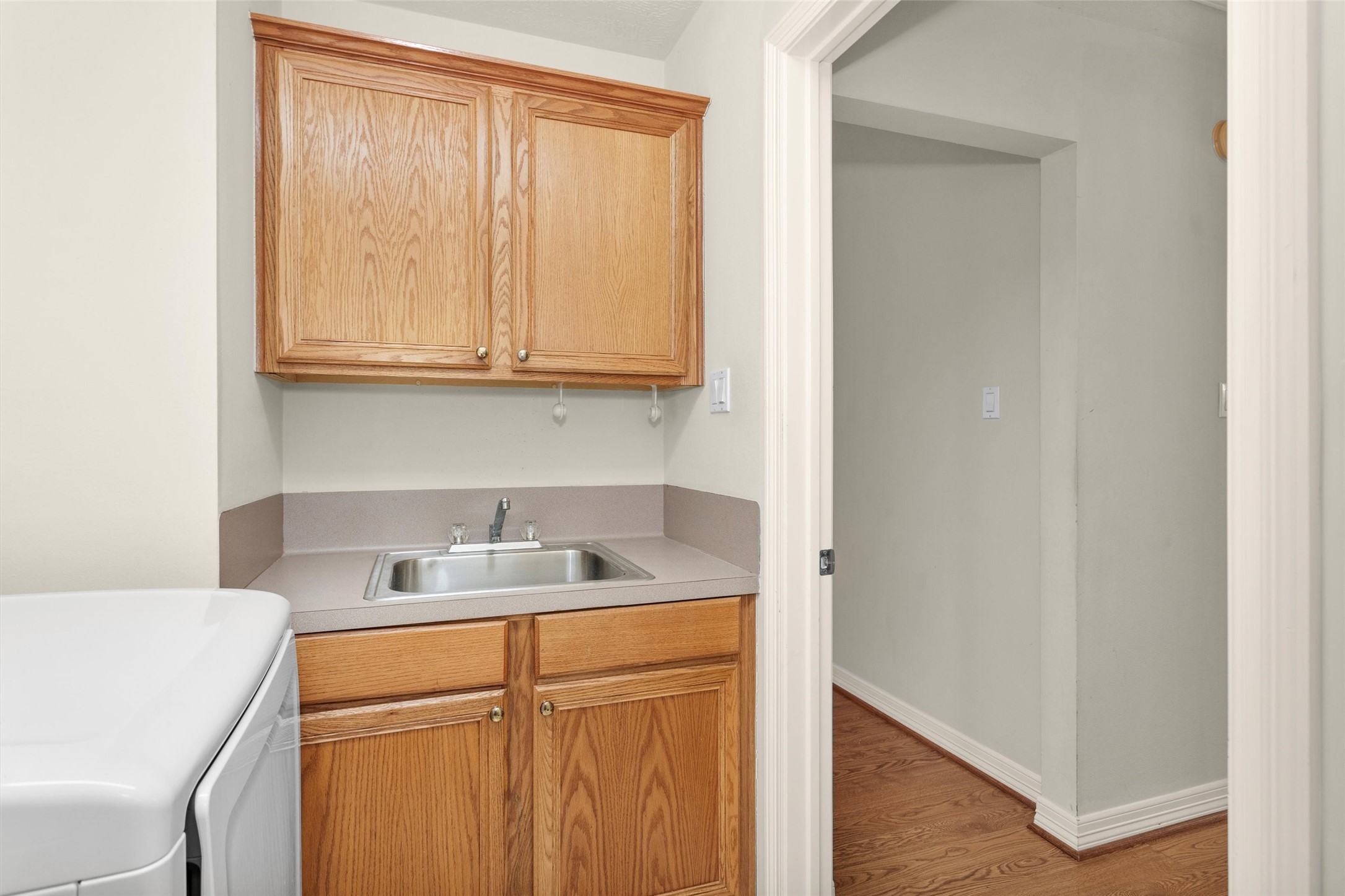 2419 Carriage Ridge Lane Conroe, TX 77384 - Photo 28 of 39 a view of cabinets and sink
