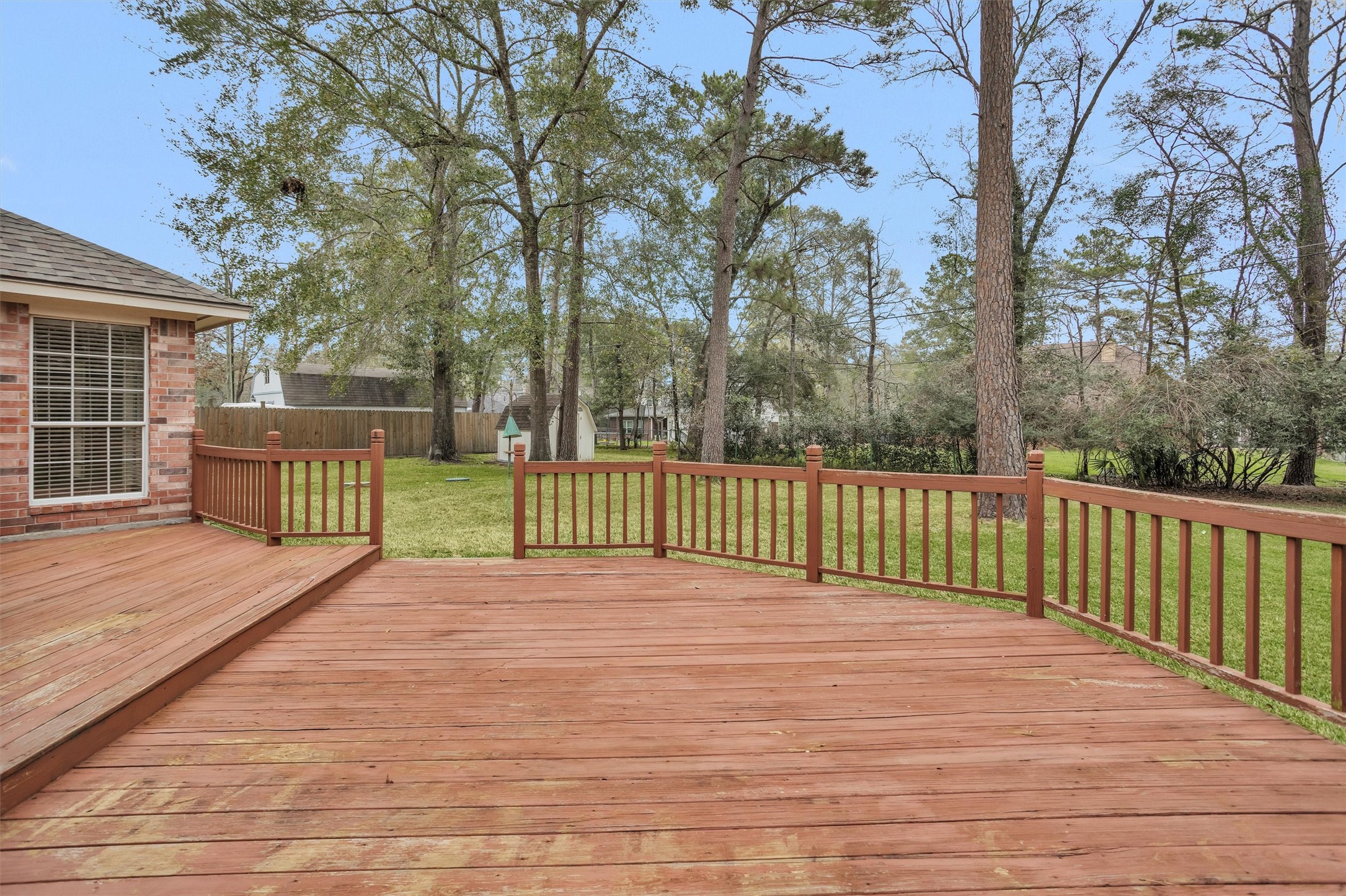 2419 Carriage Ridge Lane Conroe, TX 77384 - Photo 35 of 39 a view of a garden with trees
