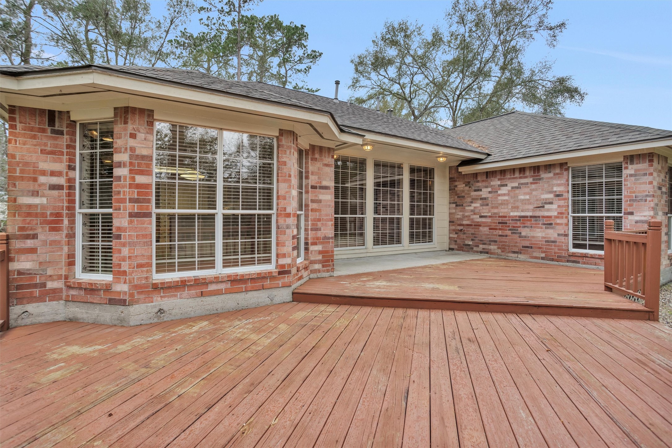 2419 Carriage Ridge Lane Conroe, TX 77384 - Photo 36 of 39 a view of front door of house with wooden floor