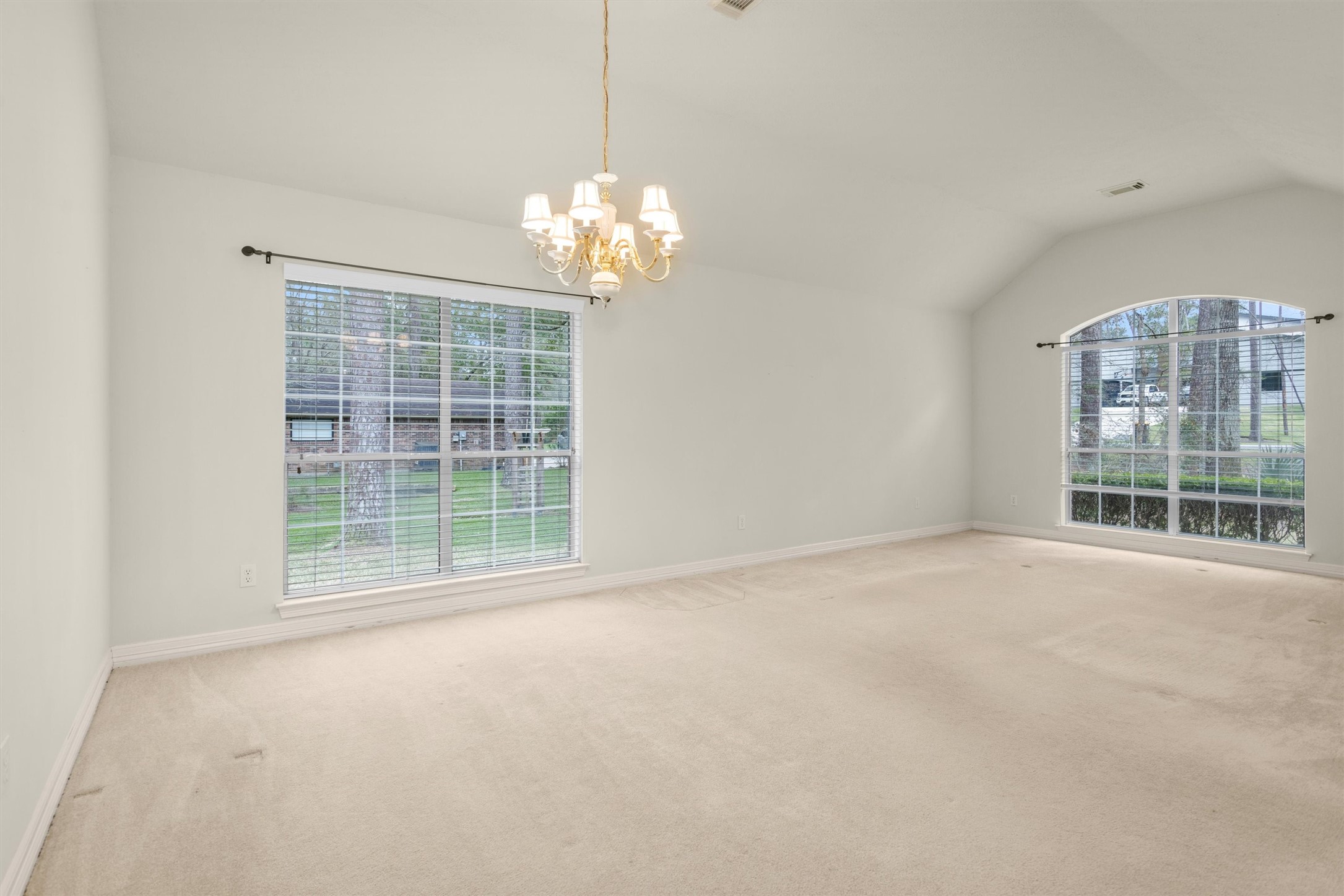 2419 Carriage Ridge Lane Conroe, TX 77384 - Photo 8 of 39 a view of an empty room with a window