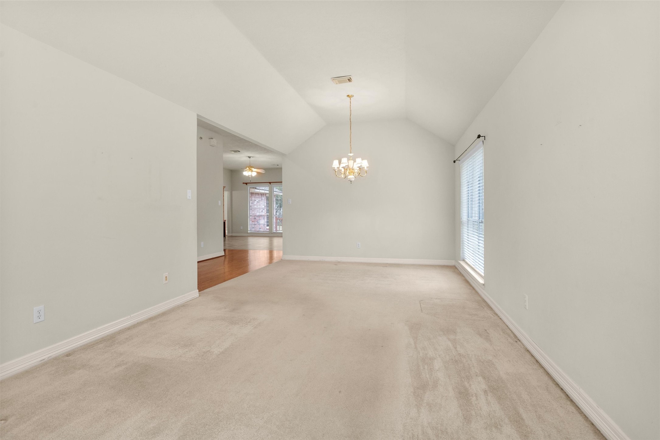 2419 Carriage Ridge Lane Conroe, TX 77384 - Photo 10 of 39 This oversized room is versatile, spacious and carpeted with neutral walls.