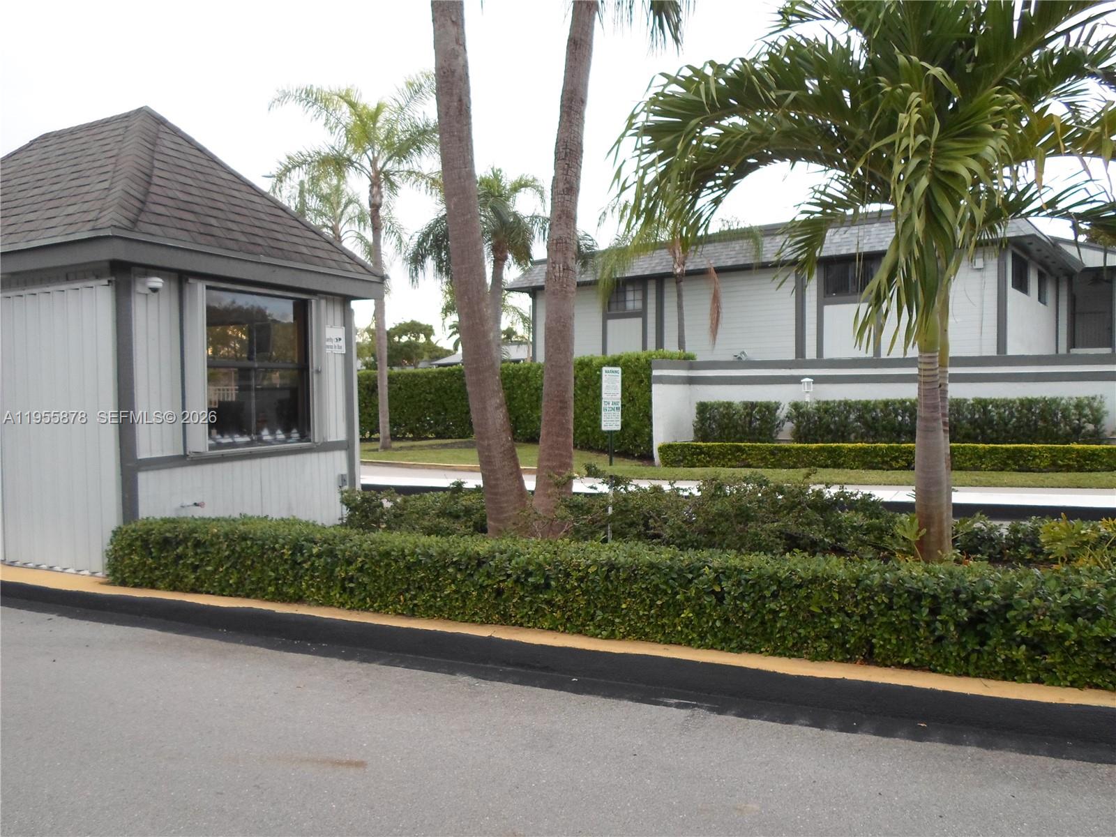 20760 Northeast 4th Court, Unit 201 Miami, FL 33179 - Photo 2 of 55 a front view of a house with a garden