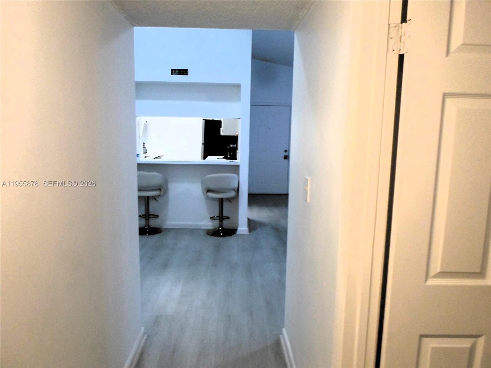 20760 Northeast 4th Court, Unit 201 Miami, FL 33179 - Photo 21 of 55 a view of kitchen and utility room