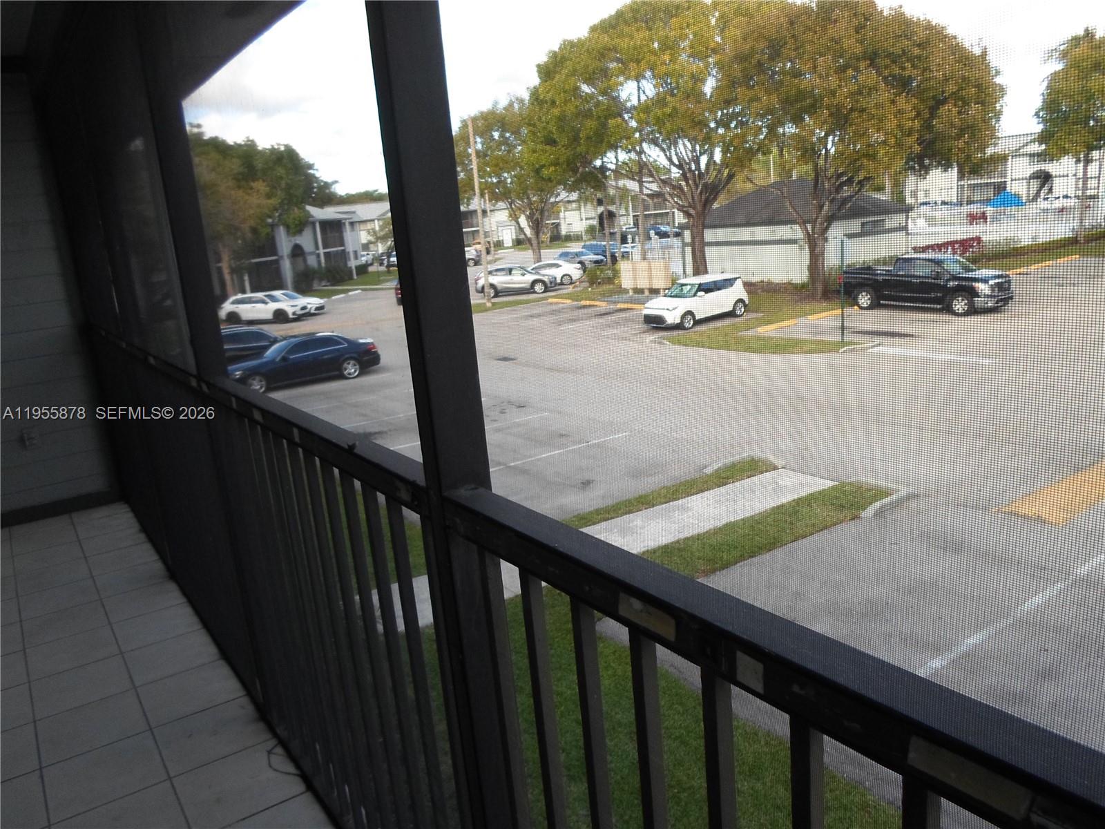 20760 Northeast 4th Court, Unit 201 Miami, FL 33179 - Photo 48 of 55 a view of swimming pool from a balcony