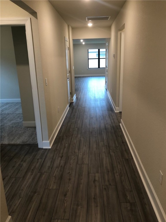 5288 Jasper Square Vero Beach, FL 32967 - Photo 8 of 14 a view of hallway with wooden floor