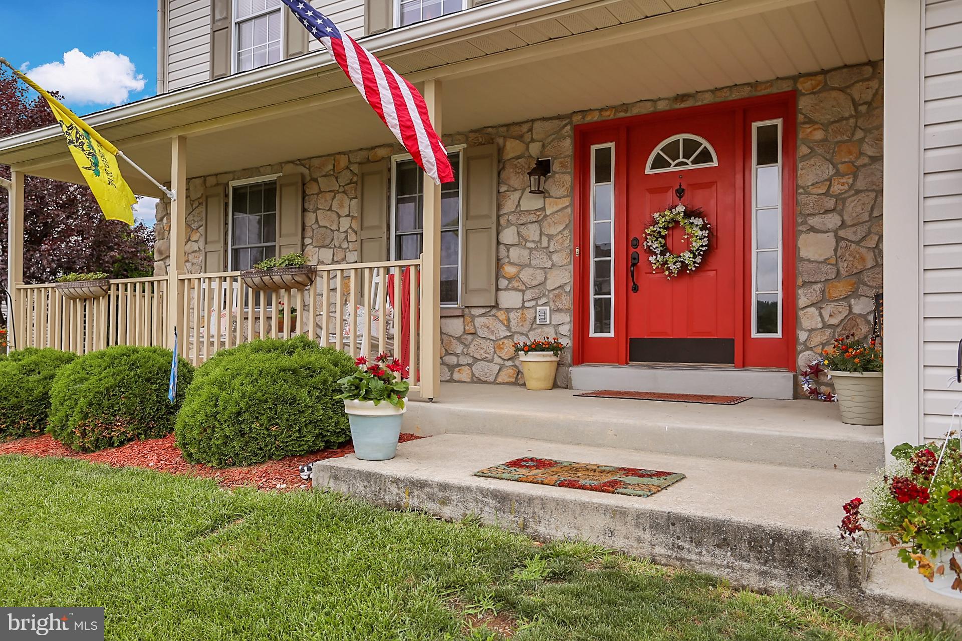 a front view of a house having yard