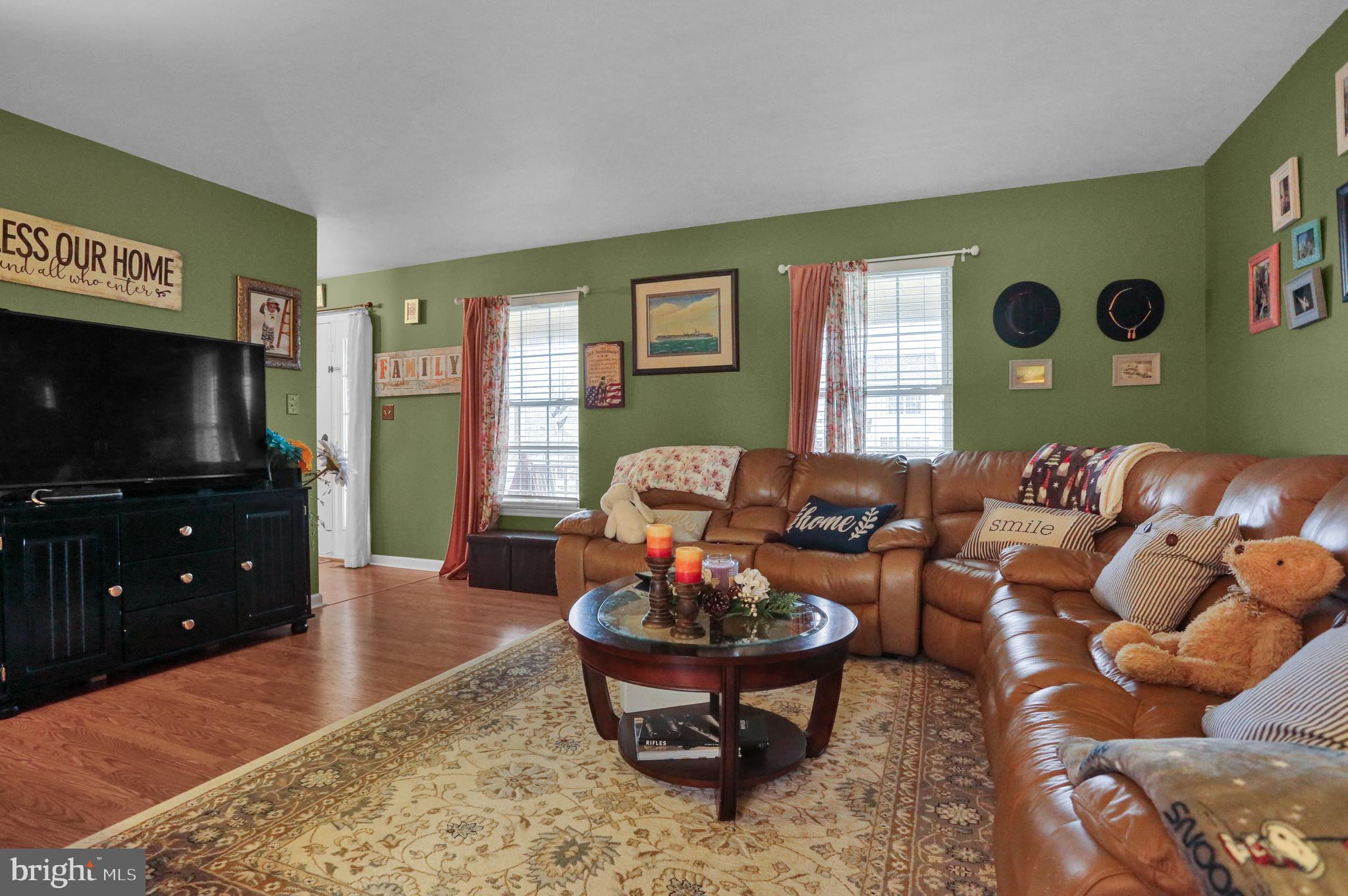 13 Roxberry Drive Reading, PA 19608 - Photo 3 of 24 a living room with furniture and a flat screen tv