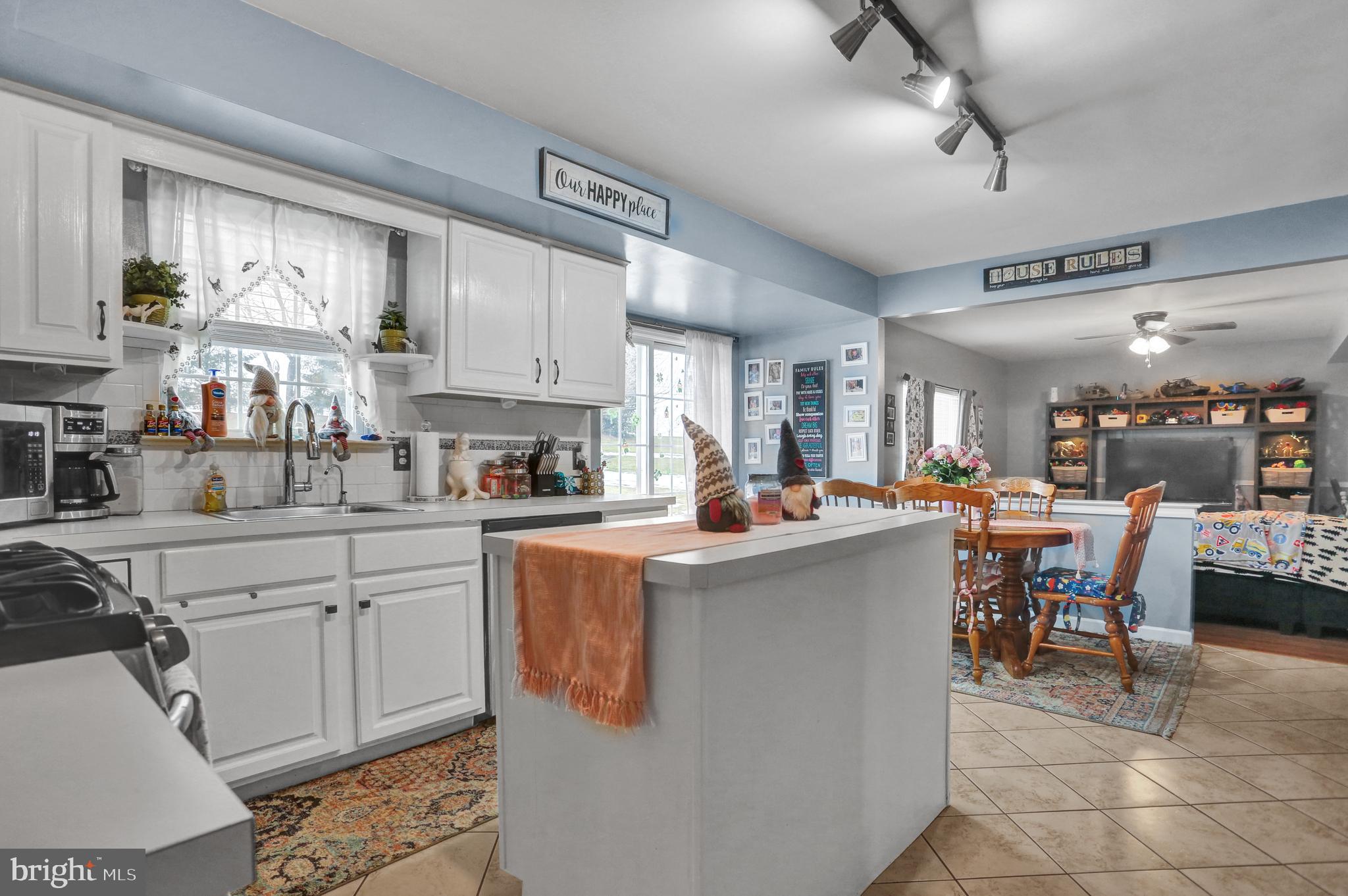 13 Roxberry Drive Reading, PA 19608 - Photo 6 of 24 a kitchen with cabinets and chairs in it