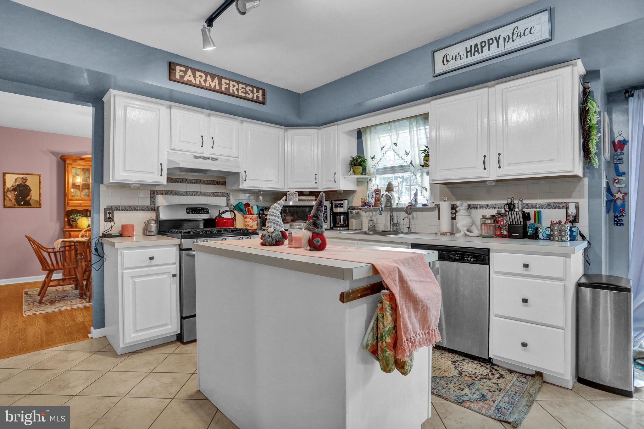13 Roxberry Drive Reading, PA 19608 - Photo 7 of 24 a kitchen with stainless steel appliances a refrigerator sink and cabinets