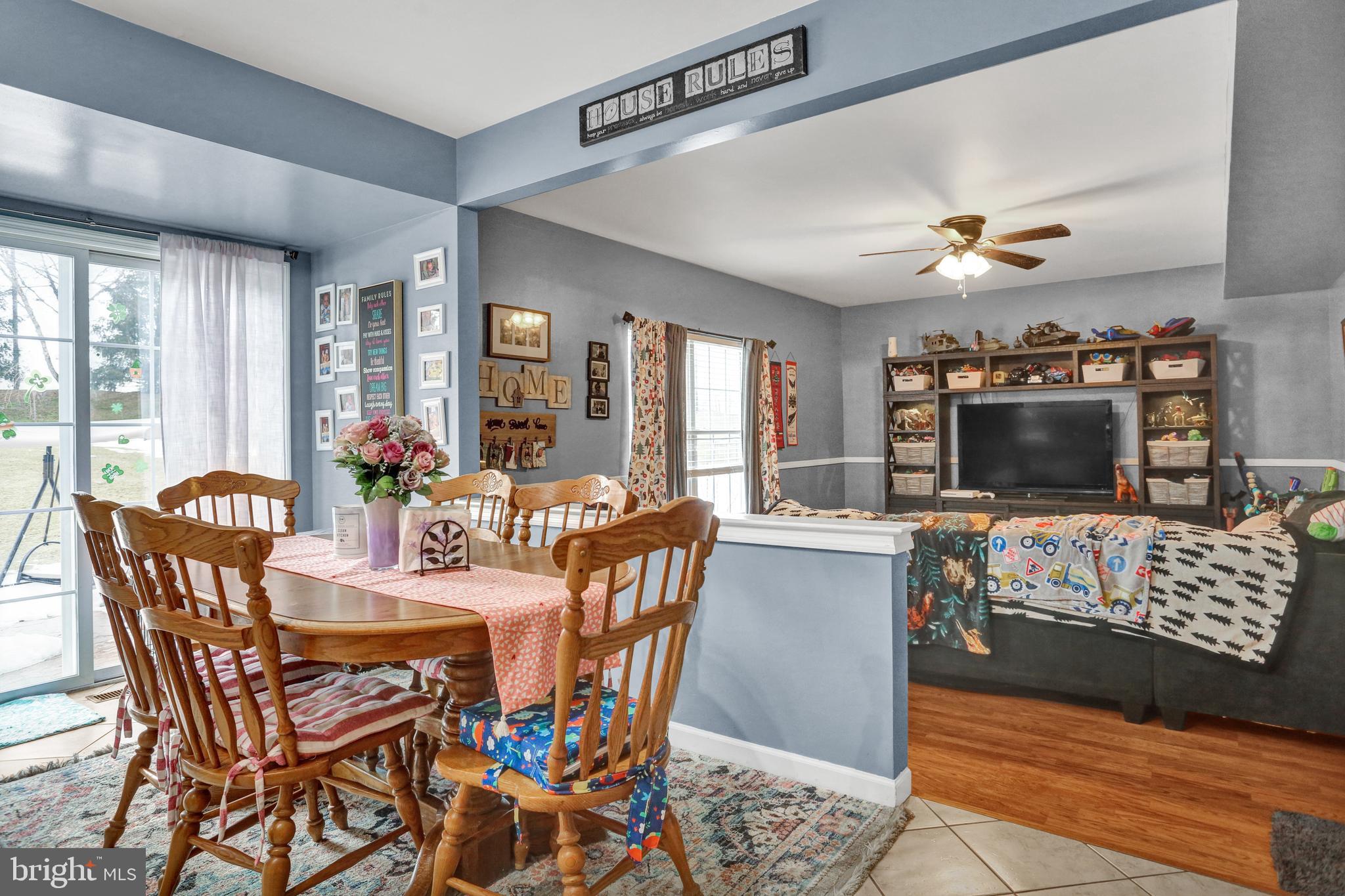 13 Roxberry Drive Reading, PA 19608 - Photo 9 of 24 a view of a dining room with furniture and a flat screen tv