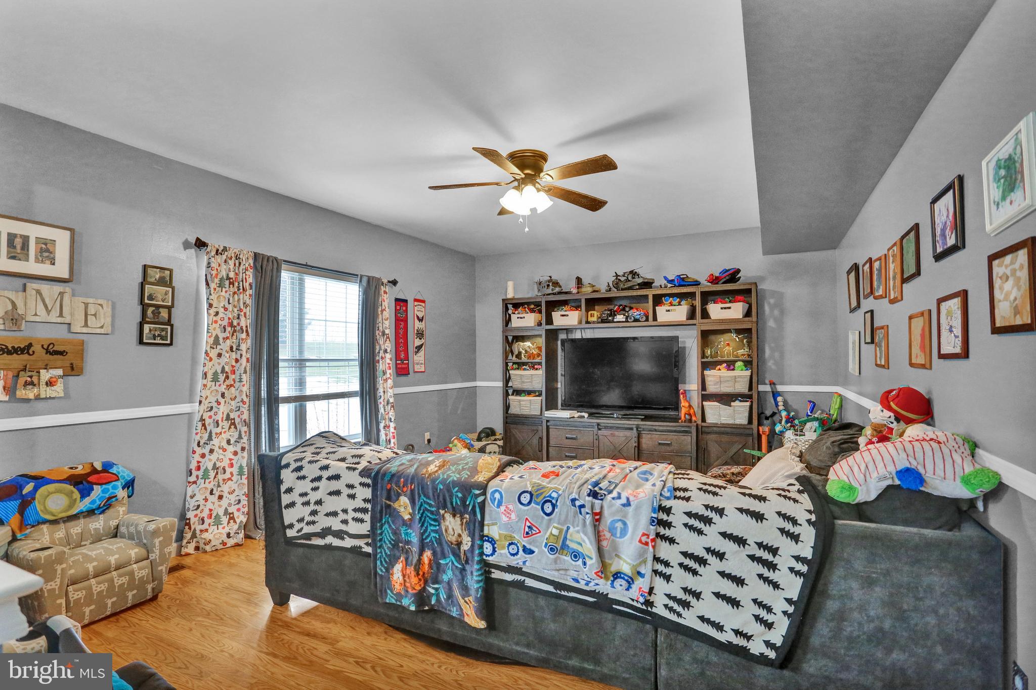 13 Roxberry Drive Reading, PA 19608 - Photo 10 of 24 a living room with furniture and a flat screen tv