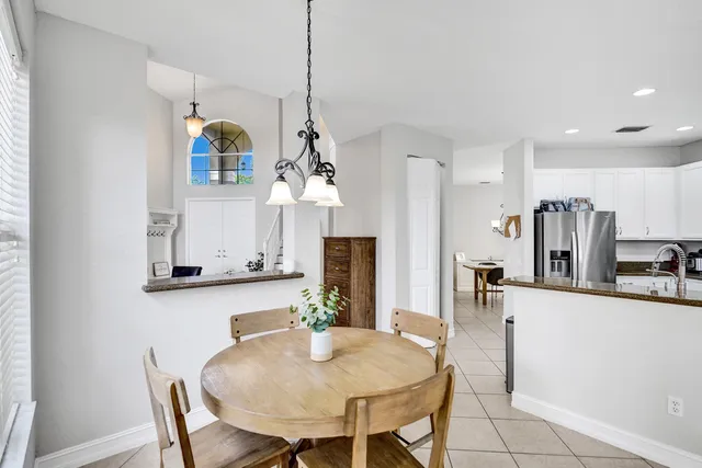 a kitchen with a sink and appliances