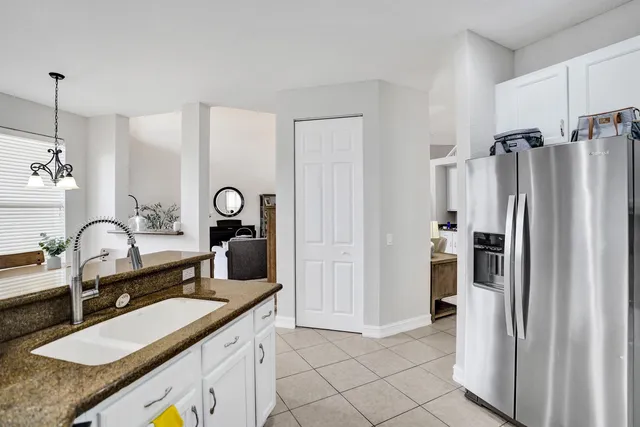 a bed room with a bed and a window