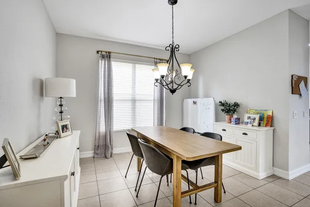 a bathroom with a shower sink and mirror