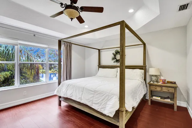 a picture of a bench in front of a wall