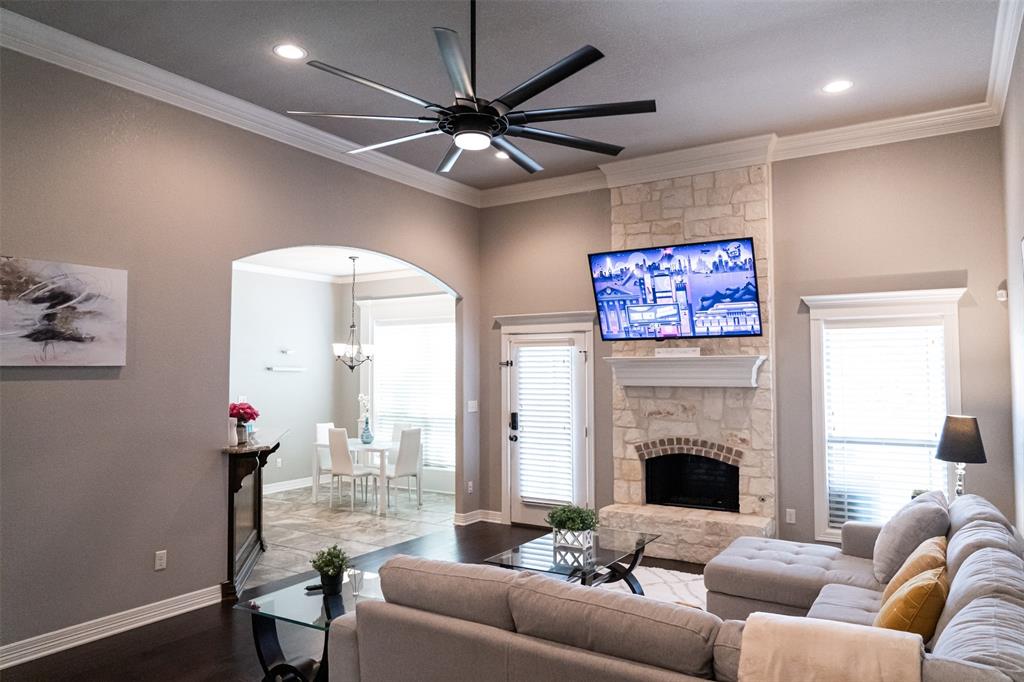 7352 Kingsport Lane Tyler, TX 75703 - Photo 2 of 38 a living room with furniture and a fireplace