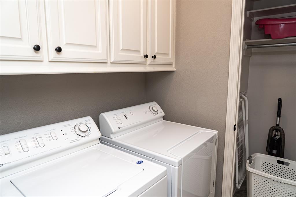 7352 Kingsport Lane Tyler, TX 75703 - Photo 26 of 38 a utility room with dryer and washer