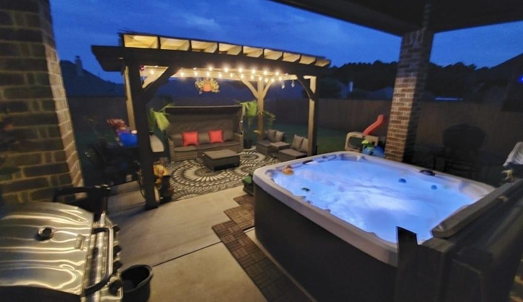 7352 Kingsport Lane Tyler, TX 75703 - Photo 3 of 38 a room with furniture a flat screen tv and a fireplace