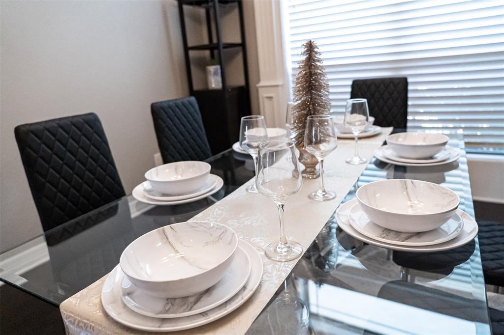 7352 Kingsport Lane Tyler, TX 75703 - Photo 6 of 38 a bathroom with a toilet a sink and a mirror