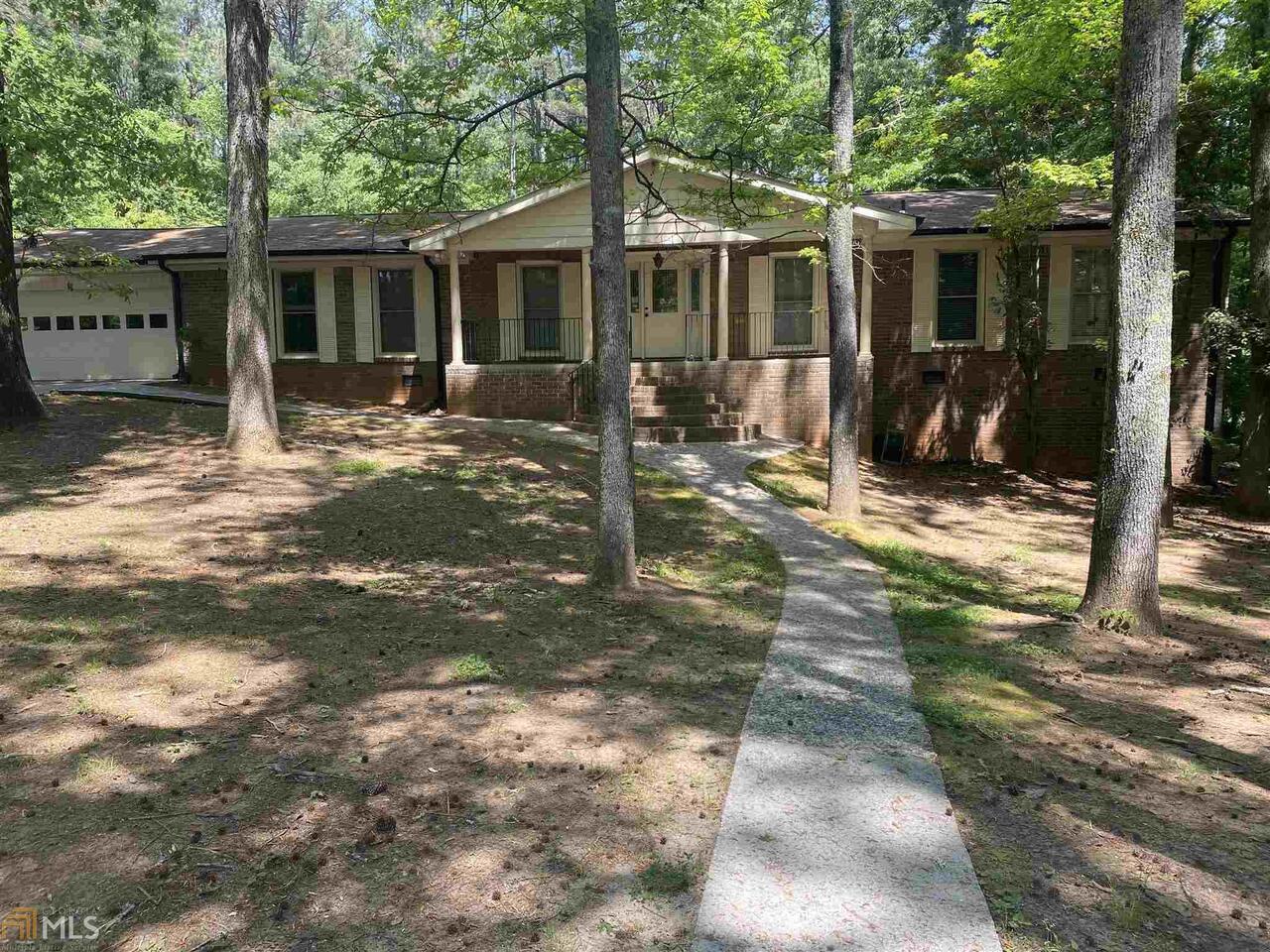 11451 Panhandle Road Hampton, GA 30228 - Photo 1 of 1 a view of a house with backyard