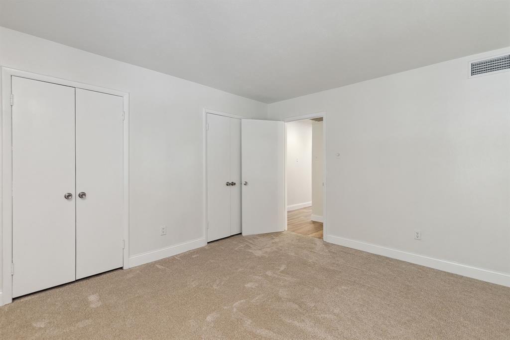 3827 Gilbert Avenue, Unit 214 Dallas, TX 75219 - Photo 13 of 25 a view of an empty room