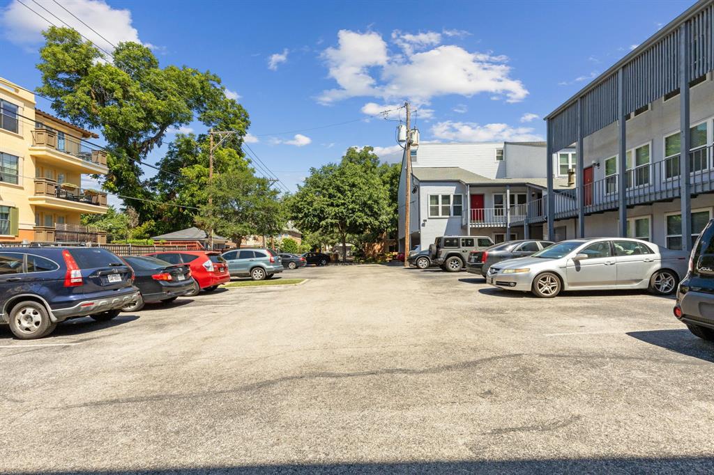 3827 Gilbert Avenue, Unit 214 Dallas, TX 75219 - Photo 25 of 25 a car parked in front of a building