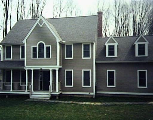 11 Side Cut Road Redding, CT 06896 - Photo 1 of 1 a front view of a house with a yard