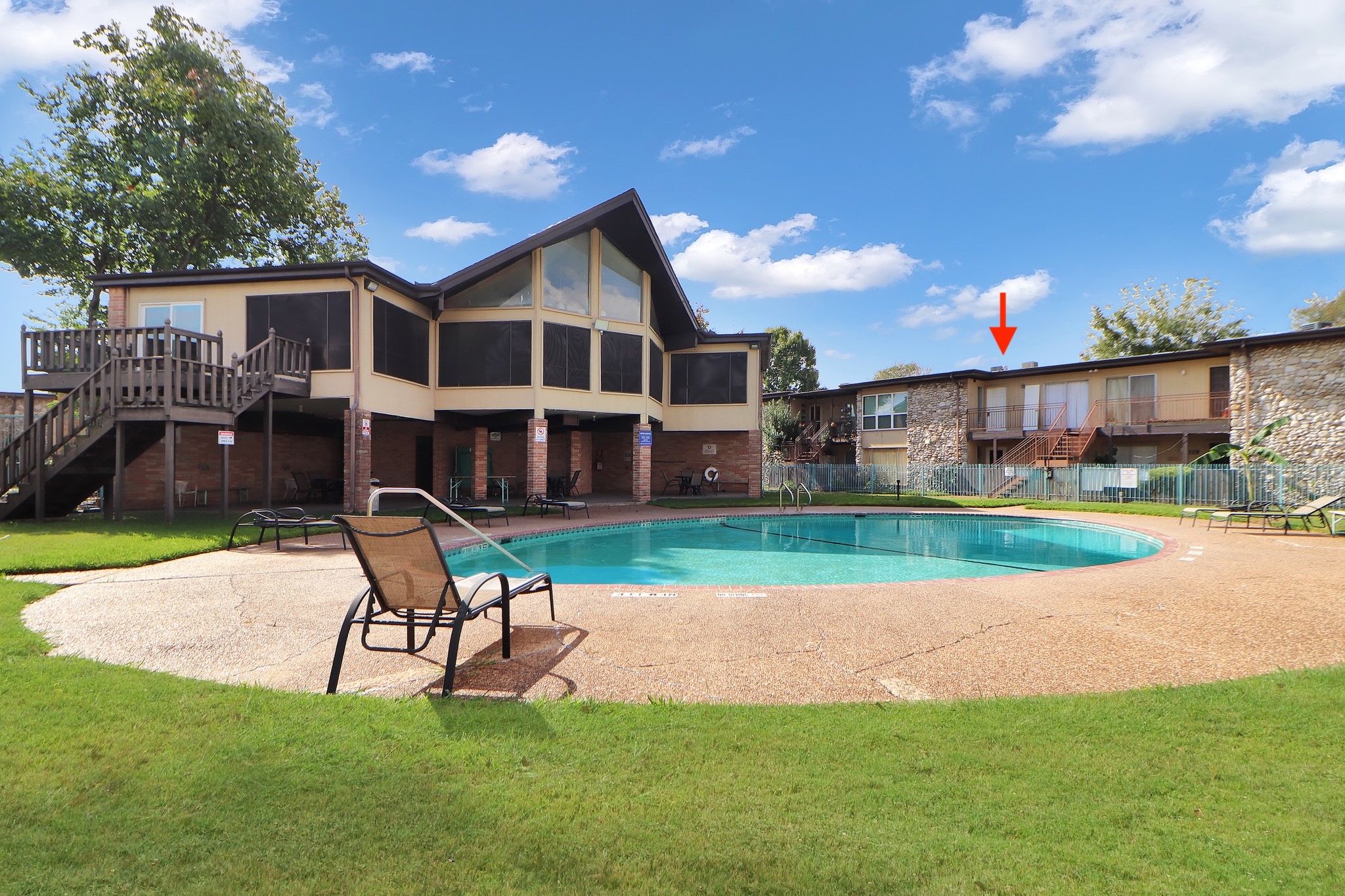 7047 Bissonnet Street, Unit 117 Houston, TX 77074 - Photo 15 of 17 a view of a house with a yard