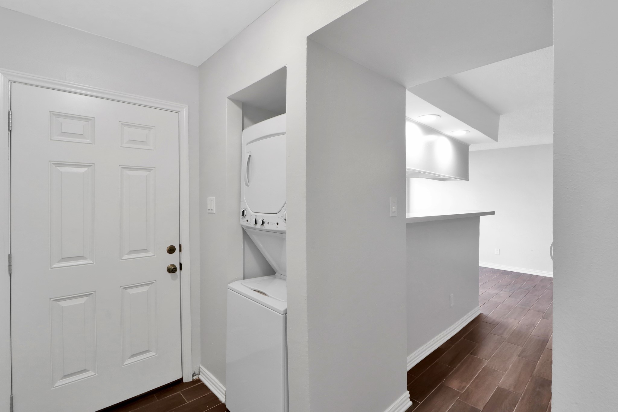 7047 Bissonnet Street, Unit 117 Houston, TX 77074 - Photo 9 of 17 a view of bathroom with a washer and dryer