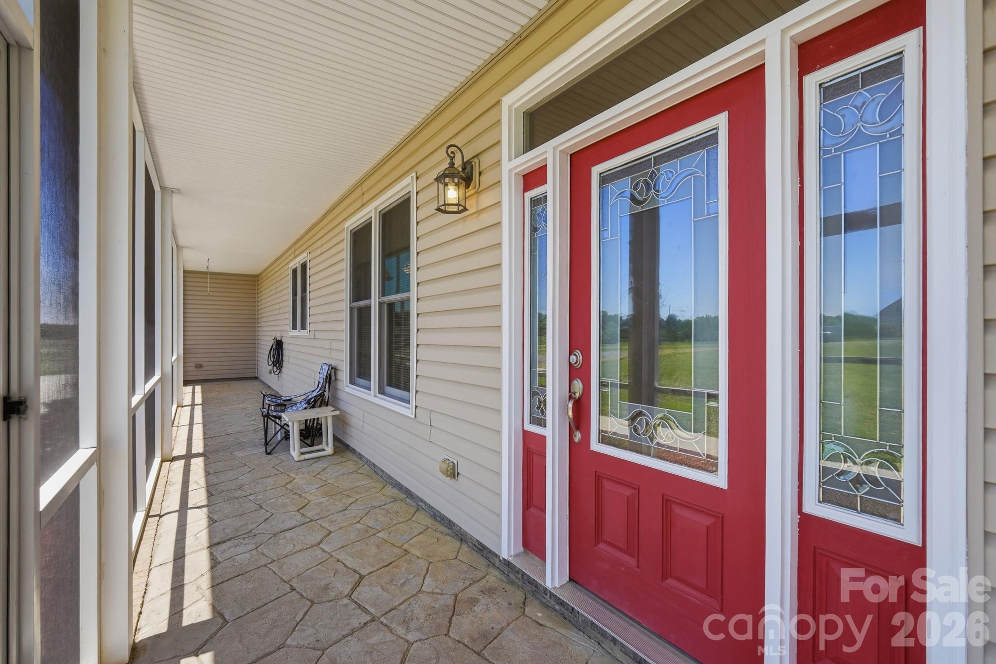 4415 Old Monroe Marshville Road Wingate, NC 28174 - Photo 4 of 28 a backyard of a house with outdoor seating
